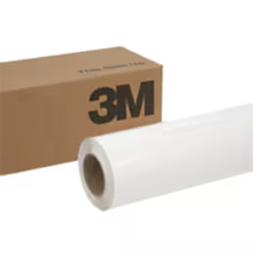 A roll of white vinyl or plastic film placed in front of a brown cardboard box printed with the large black 3M logo, on a plain white background.