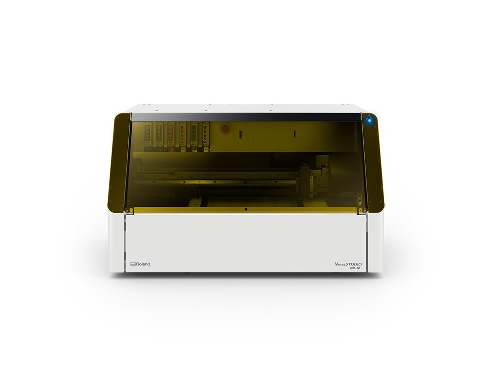 Roland DG BD-12 desktop UV printer on a white background