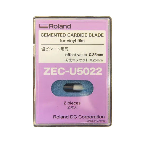 Roland ZEC-U5022 cemented carbide blade for vinyl film, packaged in a clear plastic case with a lavender label showing two small blades visible through a window.