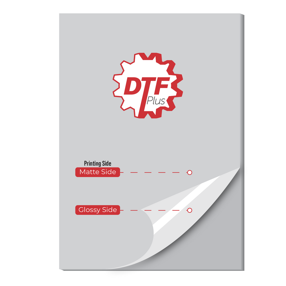 Sheets of DTF Plus transfer film with a red DTF logo, showing the matte side and glossy side of the film.