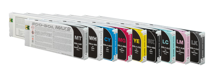 A row of Roland Eco-Sol MAX 2 toner cartridge boxes in multiple colours, including black, white, cyan, magenta, yellow, grey, light blue, light pink, and light grey, arranged diagonally on a white background.