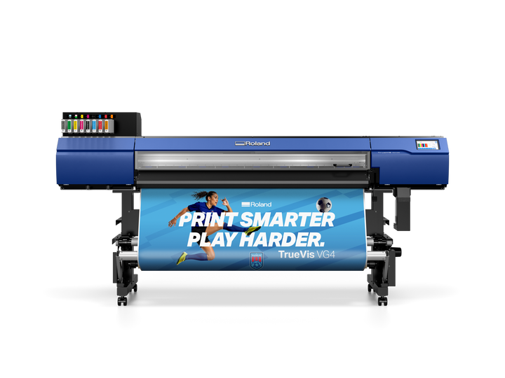 Roland DG VG4-640 printer with a banner displaying 'Print Smarter, Play Harder' on a white background
